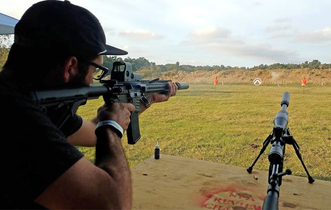 A man shoots at a target at Treasure Island Gun Range in Leesburg. The Lake County Commission recently granted a permit for the facility to operate as a commercial range, but neighbors say they are already violating the conditions of the permit. [Google]
