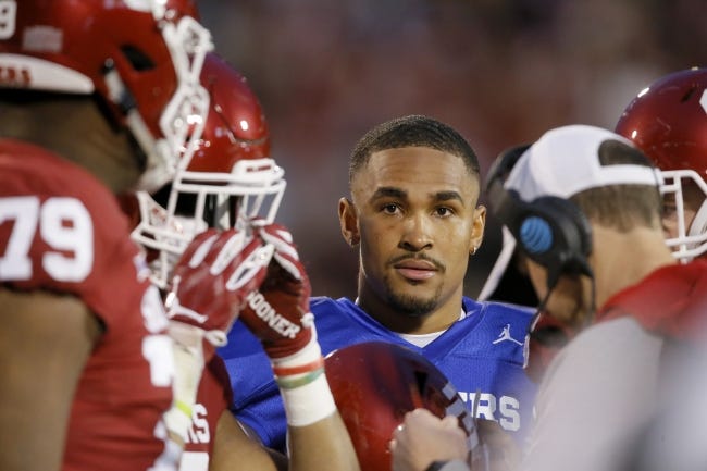 Oklahoma quarterback Jalen Hurts listens during a timeout in the spring game in April. Hurts might be a Heisman Trophy candidate this fall in his first season as the Sooners signal-caller. [Bryan Terry/The Oklahoman]