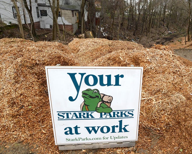 Stark Parks has begun work to clear a garbage-filled ravine north of Oxford Street in Alliance that will become part of the Iron Horse Trail.