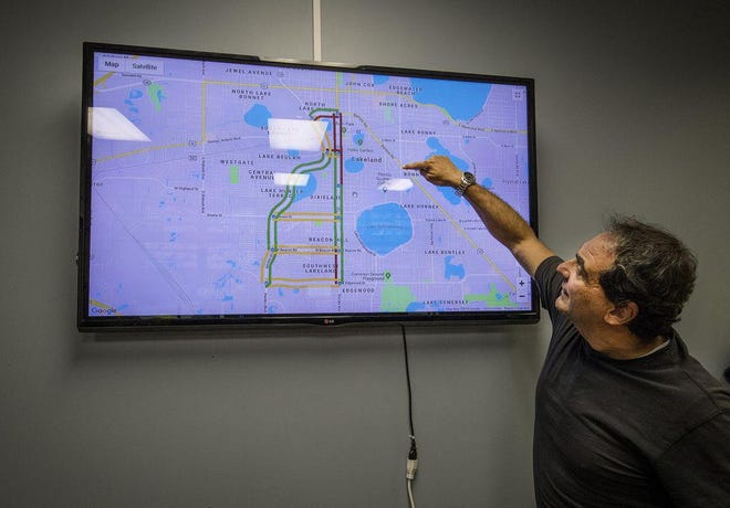 Angelo Rao, manager of Traffic Operations and Parking Services for the City of Lakeland, points to a map where Bluetooth sensors are located which monitor the speed and delay of vehicles moving through that traffic segment along South Florida Avenue, Harden and Sikes boulevards in Lakeland. [ERNST PETERS/THE LEDGER]