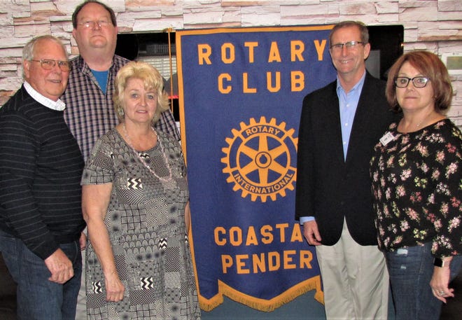 Pictured from left, Tom Dareneau and Hugh Hawthorne, Coastal Pender Rotary Club members; Barbara Mullins, RSVP director; Wesley Davis, Pender Adult Services director; and Sue Knox, Coastal Pender Rotary Club president. [CONTRIBUTED PHOTO]