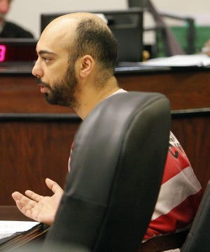 Said Ali El-Khatib appeared in Ashland Municipal Court on Monday and pleaded no contest to two 2014 theft charges and to criminal damaging for breaking a door at Motel 6 early Sunday morning. [Tom E. Puskar/Times-Gazette.com]