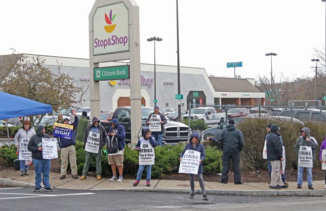 Stop & Shop picketing continues at the West River Street store in Providence on Monday. [The Providence Journal / Sandor Bodo]