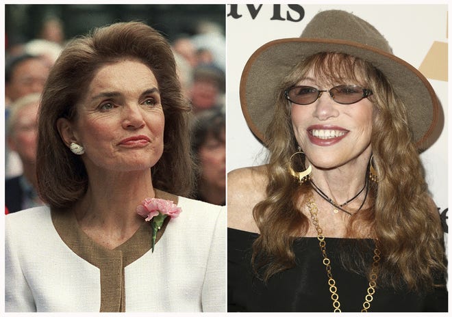 Carly Simon, right, is writing a memoir about Jacqueline Kennedy Onassis. According to the publisher, the two met at a summer party on Martha's Vineyard and began an "improbable, but lasting friendship." [AP Photo]