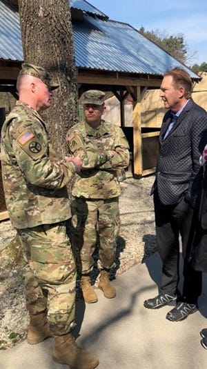 U.S. Rep. Vern Buchanan, right, meets with members of the 7th Army Training Command in Ukraine on April 14, 2019. [Provided by Office of Vern Buchanan]