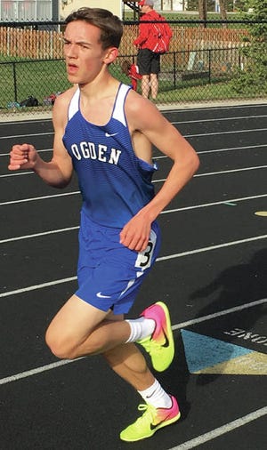 Garrett Buxton took second in the 3,200 meters (in a time of 10:32.12) last week at Earlham, and anchored two relays to third-place finishes on Monday. Photo by Andrew Logue/News-Republican