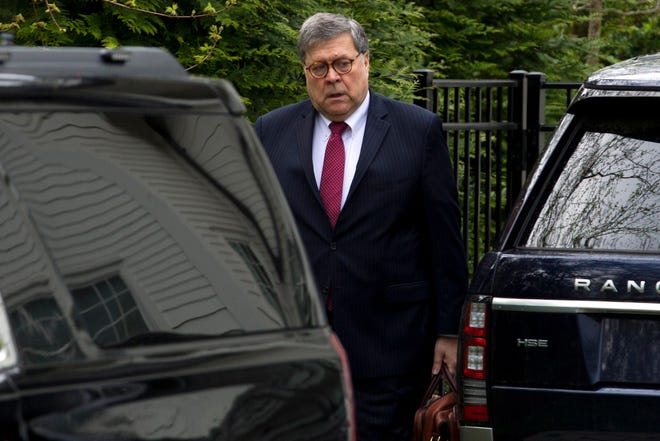 Attorney General William Barr leaves his home Monday in McLean, Va. Barr told Congress last week he expects to release his redacted version of special counsel Robert Mueller's Trump-Russia investigation report "within a week." [Jose Luis Magana/The Associated Press]