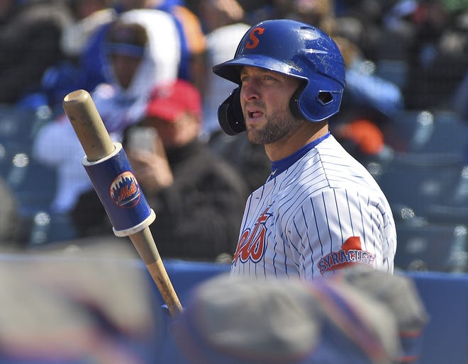 Syracuse Mets left fielder Tim Tebow waits on deck during a Triple-A game against the Pawtucket Red Sox on April 4 in Syracuse, N.Y. [Michael Greenlar/The Post-Standard via AP]