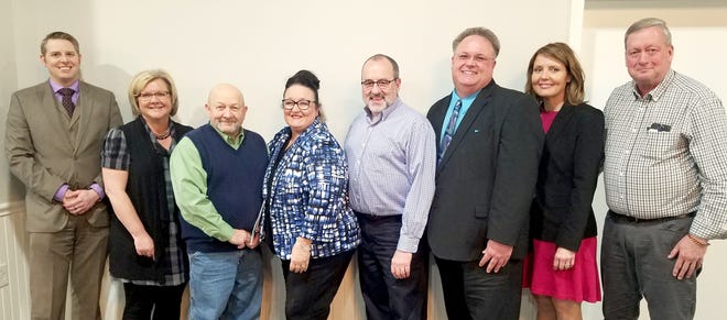 Pictured, l to r, Prosecutor Joel Blue, Kathy Jamiel, Director of Dept. of Job & Family Services, Commissioner Dave Saft, April Gibson, Ohio Peace Officer Training, Commissioner Dave Wilson, Shon Gress of the Guernsey County Senior Center, Sue Sikora of the Guernsey County Adult Protective Services, and Commissioner Skip Gardner.