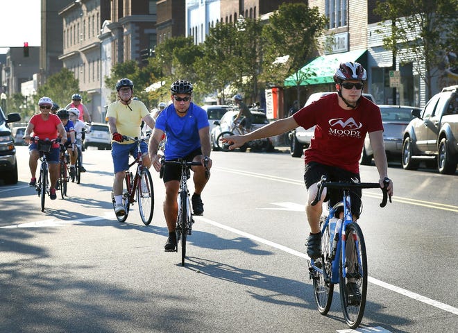 Cyclists head down Main Avenue in Gastonia during a Ride-A-Bike sponsored event in 2016.

[John Clark/Gaston Gazette]