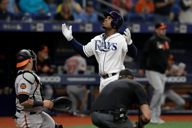 Tampa Bay Rays' Yandy Diaz reacts after his home run off Baltimore Orioles pitcher David Hess during the third inning of a baseball game Wednesday, April 17, 2019, in St. Petersburg, Fla. (AP Photo/Chris O'Meara)