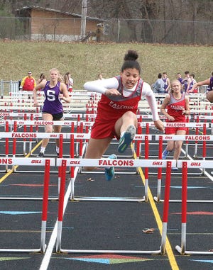 Hannah Outlaw of Constantine took first place in the 100 hurdles on Wednesday.