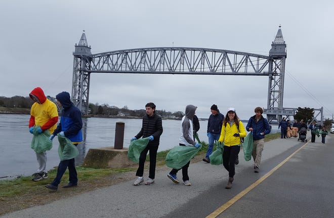 Volunteers pick up trash -- 700 pounds in 2018 -- during the Cape Cod Canal Clean Up, which takes place again on Saturday. COURTESY OF THE U.S. ARMY CORPS OF ENGINEERS