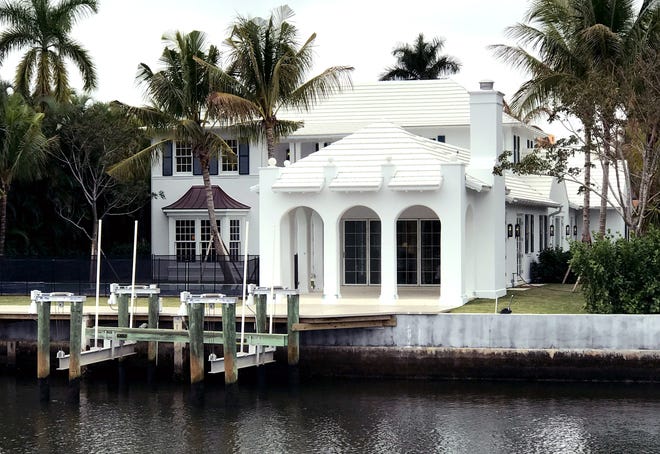 A new house at 608 Island Drive sold in late January for $15.48 million, marking the highest-dollar Palm Beach real estate sale in the first quarter. [Photo by Darrell Hofheinz/palmbeachdailynews.com]