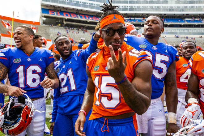 Florida wide receiver Jacob Copeland (15) dances with his team after the Orange & Blue Game on Saturday at Ben Hill Griffin Stadium. Orange beat Blue 60-35. [Lauren Bacho/Staff Photographer]