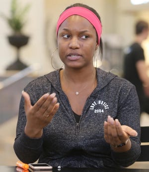 Summer Grant claims a Christian school kicked out her two kids because she's not married and the siblings have different fathers. [PHIL MASTURZO/AKRON BEACON JOURNAL]