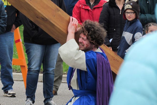 “Way of the Cross,” a Good Friday tradition in Bronson, drew participants from local churches and the community. A cast of 25 surrounded Jesus, portrayed by Danny Erwin, youth pastor at First Baptist Church in Coldwater.