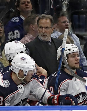 Columbus Blue Jackets head coach John Tortorella works with the team during the third period of Game 1 of an NHL Eastern Conference first-round hockey playoff series against the Tampa Bay Lightning on Wednesday, April 10, 2019, in Tampa, Fla. (AP Photo/Chris O'Meara)