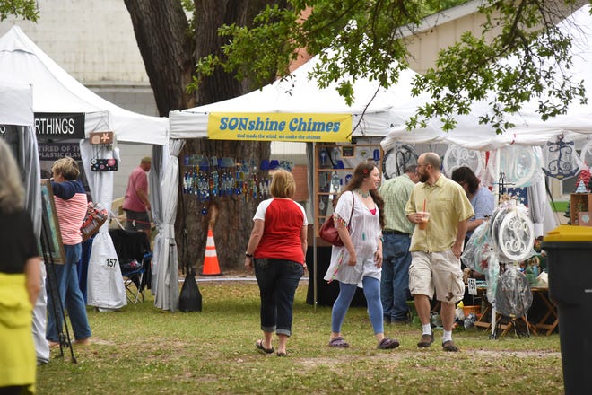 Hundreds of people came out Friday to take part in the first day of the Southport Spring Festival in Franklin Square. The event that runs until 5pm Friday continues Saturday April 20, 2019 from 10 am to 4 pm. Over 170 crafters and entertainers will be part of the celebration-hosting children's activities, a plant and flower sale, and a large selection of delicious food. Free Admission. [KEN BLEVINS/STARNEWS]