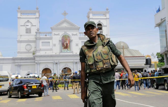 Sri Lankan Army soldiers secure the area around St. Anthony's Shrine after a blast in Colombo, Sri Lanka, Sunday, April 21. Witnesses are reporting two explosions have hit two churches in Sri Lanka on Easter Sunday, causing casualties among worshippers.