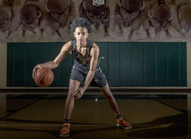 The Villages' Tre Mann, who averaged 23.6 points and 4.9 rebounds per game for the Buffalo and scored at least 30 points in a game on 10 occasions, is the Daily Commercial's boys basketball All-Area Player of the Year. [PAUL RYAN / CORRESPONDENT]