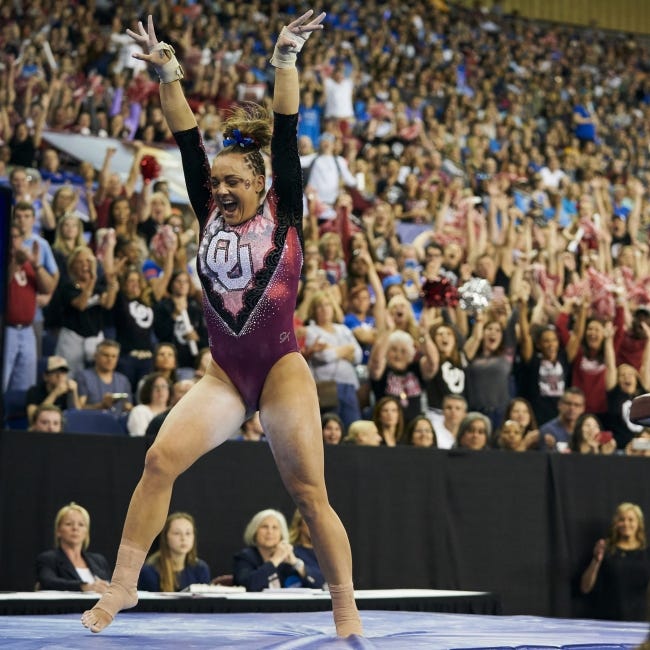 Oklahoma gymnast Maggie Nichols celebrates after vaulting at the 2019 NCAA women's gymnastics championships. She wants a chance at going to nationals again, an opportunity lost this year to the coronavirus pandemic. [AP PHOTO/COOPER NEILL]