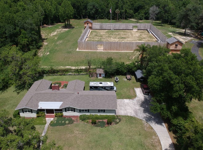 The house and property that sits between the entrance to the Fort King National Historic Landmark and the historic cemetery is being purchased by the City of Ocala, Marion County and the Fort King Heritage Association. [Doug Engle/Ocala Star-Banner]