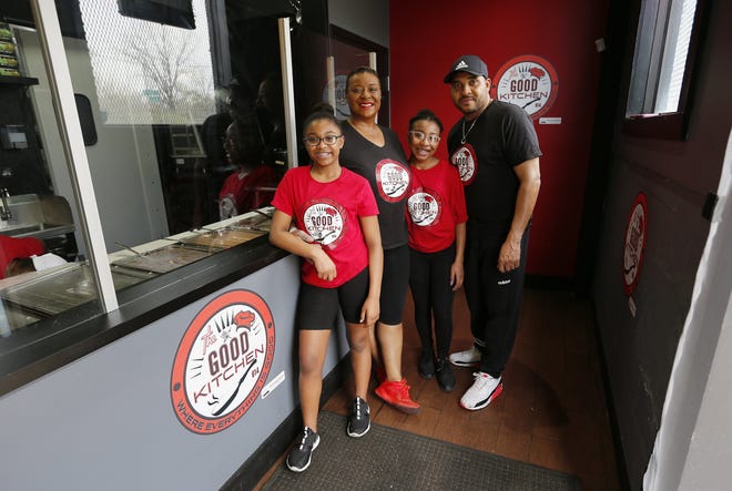 Owners Serena and Will Travis with their daughters Sydnie, left, and Sierra, stand inside The Good Kitchen 614 at 1485 Sunbury Road in Columbus on Thursday, April 18, 2019. [Adam Cairns/Dispatch]