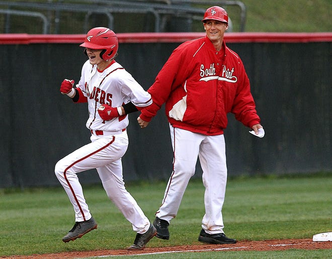 South Point head coach Jason Lineberger watches as Preston Conner rounds third base after hitting a three-run home run during their game against R-S Central Friday night at South Point High School. [JOHN CLARK/THE GASTON GAZETTE]