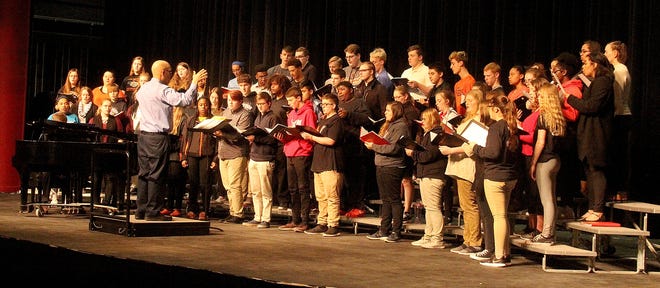 Members of the Freeport High School concert choir perform on stage during The Opus Project on Tuesday, April 16, 2019, in the Jeannette Lloyd Theatre at Freeport Middle School in Freeport. [JANE LETHLEAN/THE JOURNAL-STANDARD CORRESPONDENT]