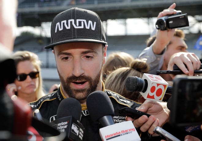 James Hinchcliffe speaks with the media after failing to qualify for the 2018 Indianapolis 500. Since his failure, team owners Chip Ganassi and Michael Andretti have joined Roger Penske in calling for guaranteed spots in the Indianapolis 500. [DARRON CUMMINGS/THE ASSOCIATED PRESS]