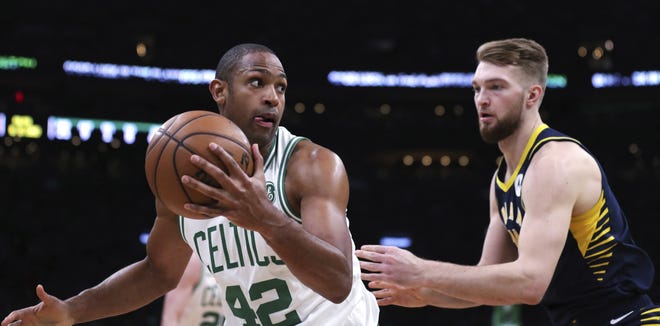 Boston center Al Horford looks to drive past Indiana forward Domantas Sabonis during the second quarter of Game 2 of their first-round playoff serieson Wednesday in Boston. [Charles Krupa/The Associated Press]