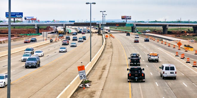 Traffic travels on I-40 under the newly expanded Sara Road bridge in Oklahoma City, Okla. on Tuesday, April 23, 2019. The expansion of the bridge allows Sara Rd. to accommodate the on and off ramps for the John Kilpatrick as part of the overall plan to expand to Mustang. [Chris Landsberger/The Oklahoman]