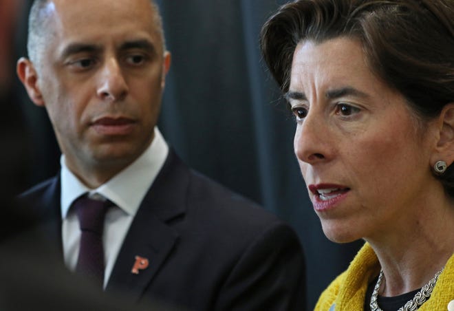 Gov. Gina Raimondo and Providence Mayor Jorge Elorza announce a state evaluation of the city's struggling schools during a Tuesday news conference at the Rhode Island Convention Center. [The Providence Journal / Steve Szydlowski]