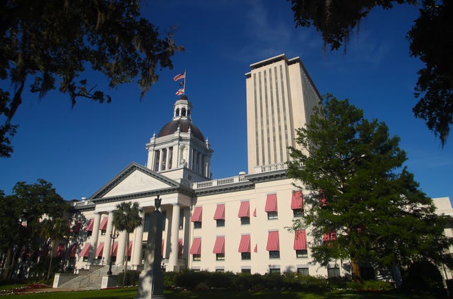 An American flag flies over the Florida Capitol, Tuesday in Tallahassee. The Florida Legislature is in its final two weeks of session. [Phil Sears/The Associated Press]