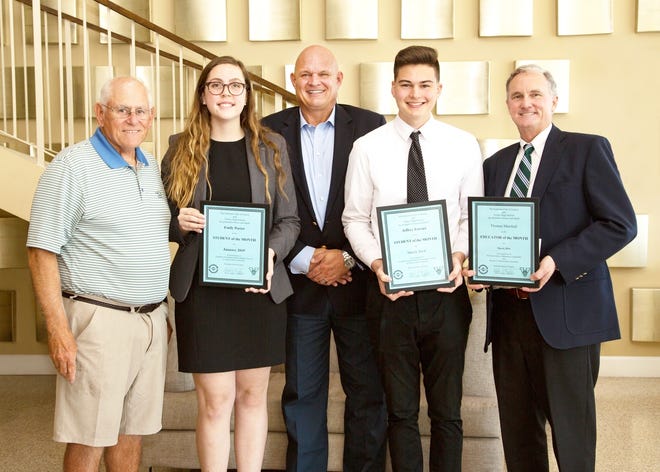From left, Sertoma Club member Bob Vedder, who organizes the education recognition program, Student of the Month Emily Porter, Sertoma President Stephen Lingley, Student of the Month Jeffrey Ferarri and Teacher of the Month Thomas Marshall. [Photo provided by Prion Photography]