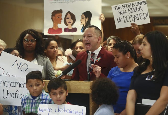 Rep. Carlos Guillermo Smith (D-Orlando) speaks out against Family Separation Bills HB 527 and SB 168 on Tuesday, during a press conference in the Florida Capitol [Phil Sears/The Associated Press]
