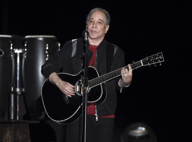 This Sept. 22, 2018 file photo shows singer-songwriter Paul Simon performing in Flushing Meadows Corona Park during the final stop of his Homeward Bound - The Farewell Tour in New York. Simon is donating all net proceeds from his 2019 Outside Lands Festival performance to two environmental organizations. The icon announced Tuesday that his Aug. 11 performance will benefit the San Francisco Parks Alliance and Friends of the Urban Forest. The Outside Lands Festival will take place Aug. 9-11 at San Francisco's Golden Gate Park. [Photo by Evan Agostini/Invision/AP, File]