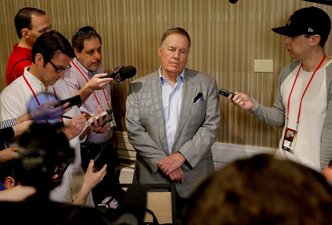 New England Patriots head coach Bill Belichick speaks to the media during the NFC/AFC coaches breakfast during the annual NFL owners meetings in March in Phoenix. (AP File Photo/Matt York)