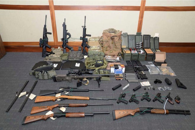 Firearms and ammunition that was in the motion for detention pending trial in the case against Christopher Paul Hasson. Hasson, a Coast Guard lieutenant accused of stockpiling guns and compiling a hit list of prominent Democrats and network TV journalists looked at other targets: two Supreme Court justices and two executives of social media companies, according to federal prosecutors in a court filing Tuesday. [U.S. District Court via AP]