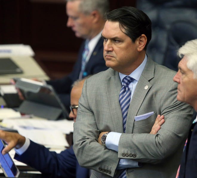 Rep. Cord Byrd, R-Neptune Beach, listens to the debate on an immigration bill he sponsored during session Wednesday in Tallahassee. The Florida House has passed a high-profile Republican bill requiring local law enforcement agencies to cooperate with federal immigration authorities and banning so-called "sanctuary city" policies that shield immigrants who are arrested. [Steve Cannon/The Associated Press]