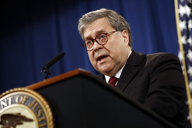 Attorney General William Barr speaks about the release of a redacted version of special counsel Robert Mueller's report during a news conference, Thursday, April 18, 2019, at the Department of Justice in Washington. (AP Photo/Patrick Semansky)