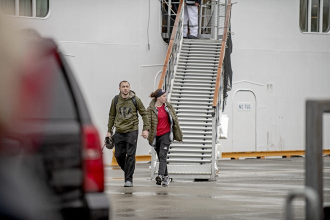 Matt and Jamie Burgasser were spotted by photographer Nils Harald Aanstad as they stepped off the Viking Sky cruise ship in Norway and the journalist knew he had found a story.

(Nils Harald Aanstad / Sunnmoersposten)