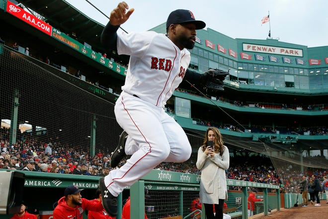 Boston Red Sox's Jackie Bradley Jr. takes the field during the at the start of a baseball game against the Detroit Tigers in Boston, Thursday, April 25, 2019. (AP Photo/Michael Dwyer)