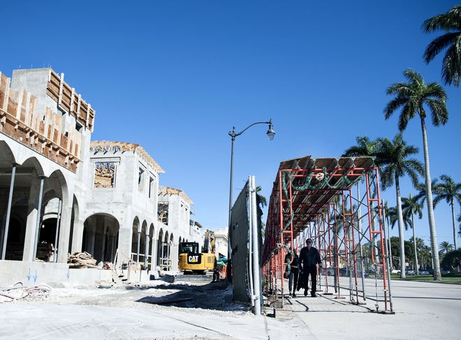 Work continues in Palm Beach earlier this year on the former Testa's site, where a worker died Wednesday after a fall at the site. [Meghan McCarthy/palmbeachdailynews.com]