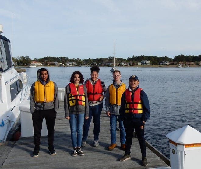 At the Shoreline Marina, NJROTC participants learn the important lesson that the first ones back must help the others docking. [CONTRIBUTED PHOTO]