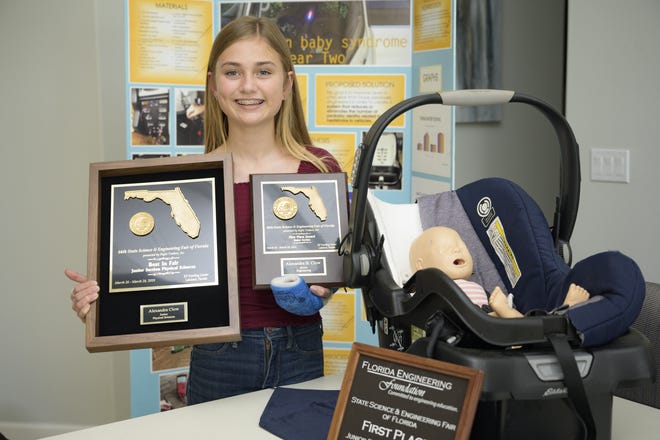 Lexie"Clow has won many awards for her invention, including the most recent State Science Fair title, which will send her on to the national competition. The car seat sounds a car's horn and activates its lights when the seat is left in a hot vehicle. [Cindy Sharp/Correspondent]