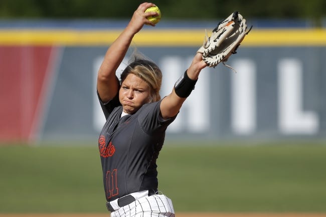 Oklahoma State's Samantha Clakley (11) pitches during a Big 12 softball tournament game between Oklahoma State University (OSU) and Texas Tech at ASA Hall of Fame stadium in Oklahoma City, Friday, May 11, 2018. Photo by Bryan Terry, The Oklahoman