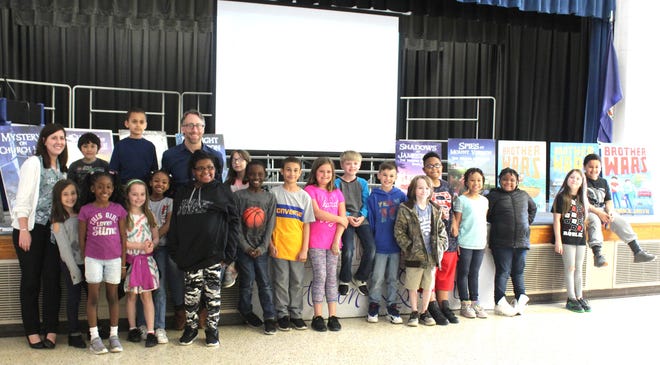Richmond author Steven K. Smith visits Lakeview Elementary School third, fourth and fifth graders to give a presentation, answer questions and sign students' books on April 11. Smith also visited Tussing and North Elementary Schools. [Kelsey Reichenberg/Colonial Heights Public Schools]