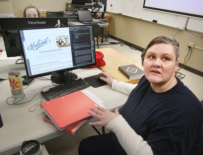 Suzanne Hayden is developing an online resource for parenting, using coding skills she has learned through a new course at Topeka Correctional Facility. [Thad Allton/The Capital-Journal]